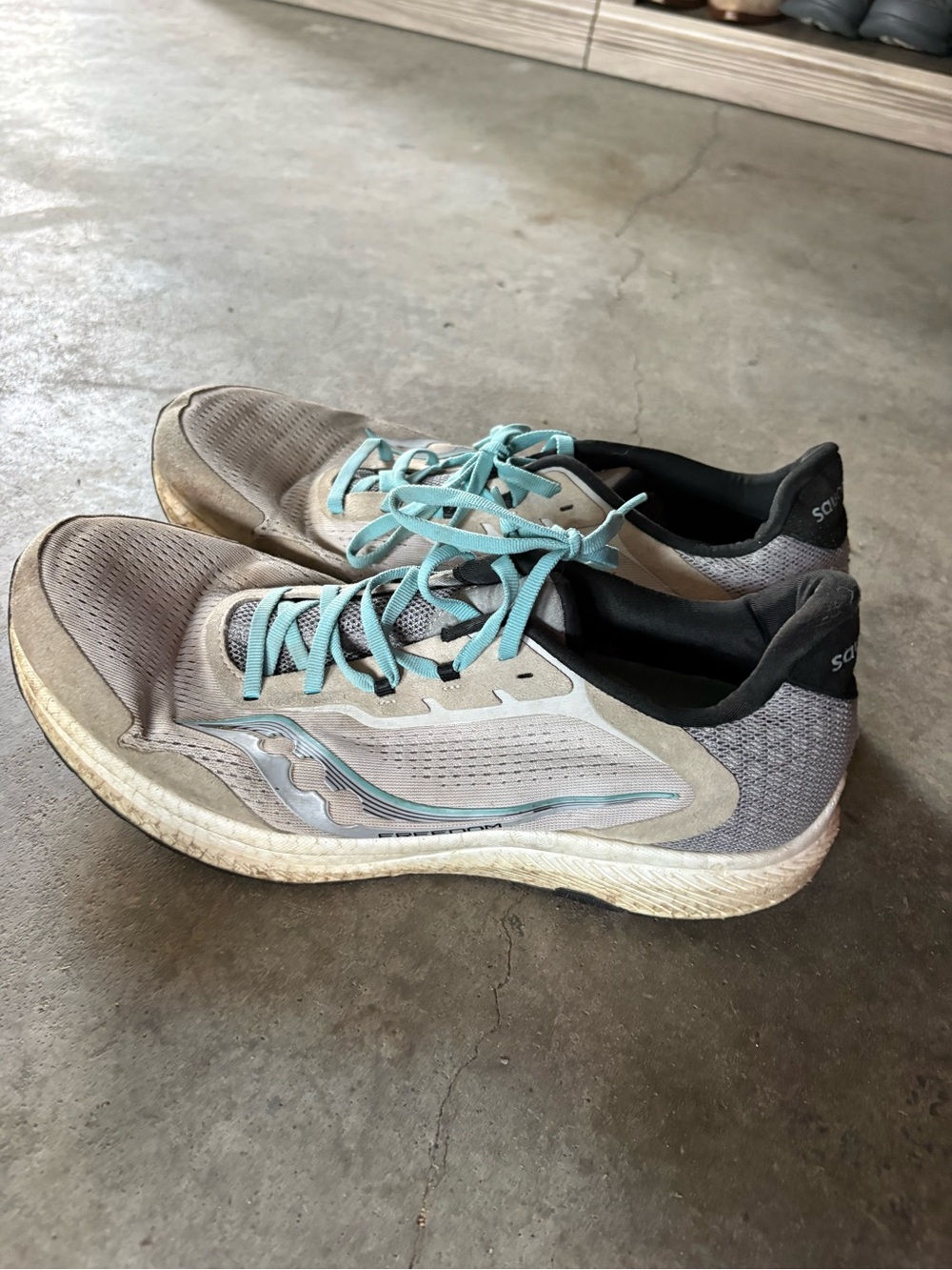 Saucony Gray Running Shoes with Teal Accents